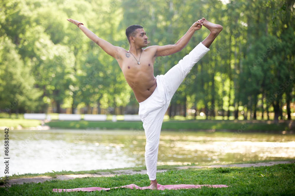 Indian young man practicing yoga