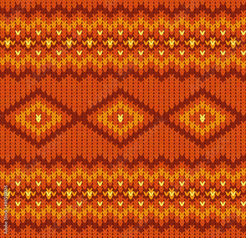 Knitted seamless pattern in red and orange colors