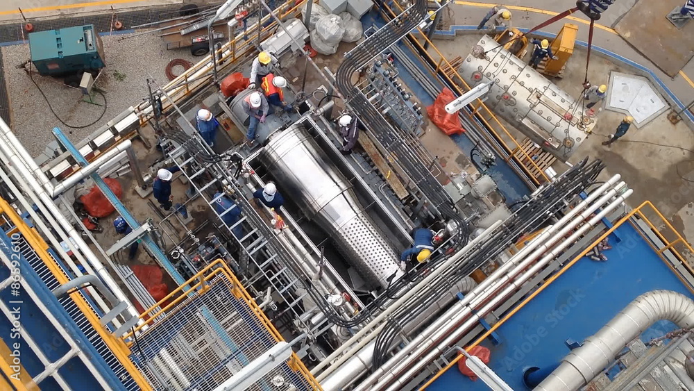 Worker to working in industrial plant - top view Worker to working in industrial plant - top view