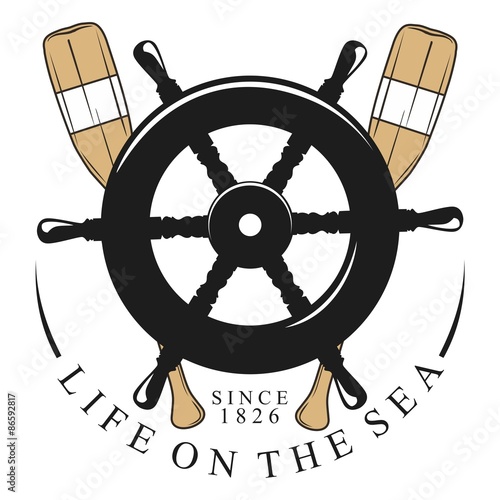 the helm of a boat with two oars behind wood and the writing life on the sea