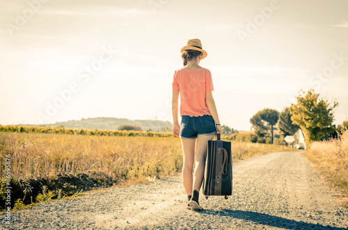 young girl is walking during her vacation - people and lifestyle concept photo