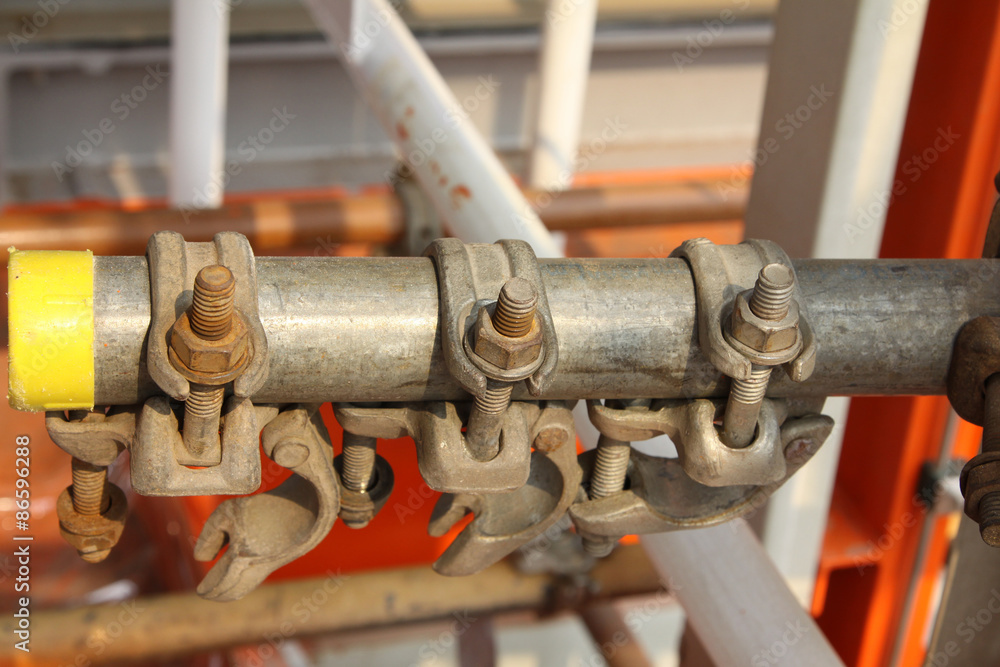 scaffolding clamps on oil and gas platform.