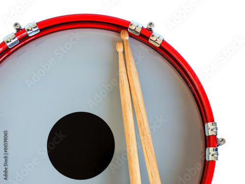 Snare drum with coated head and drumstick isolated on white background. Clipping path.
