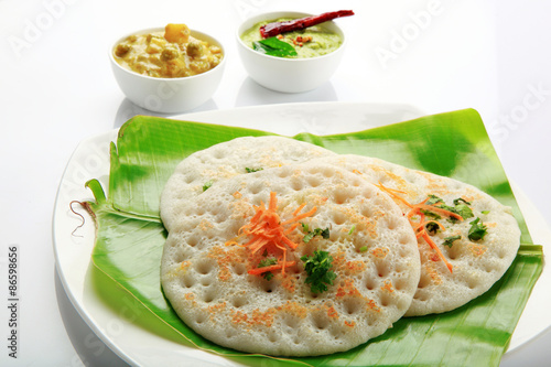 South Indian food set dosa with curry and chutney.