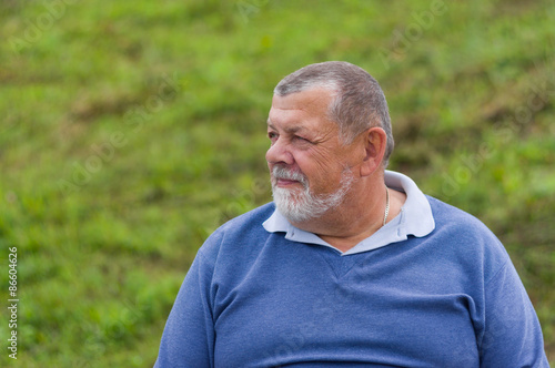 Outdoor portrait of a happy senior man