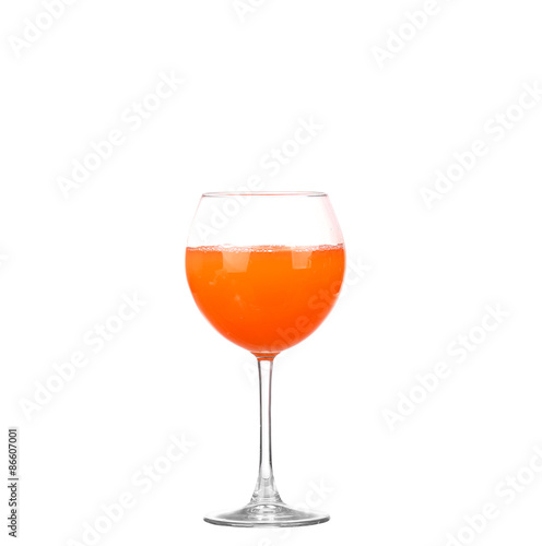 A glass of fresh grapefruit juice and grapefruit slice isolated on white background