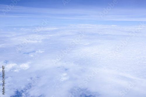 view from the window when airplane flying in the cloud