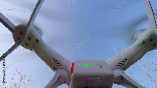 Drone quadrocopter take off with high resolution digital camera. New tool for aerial photo and video. 