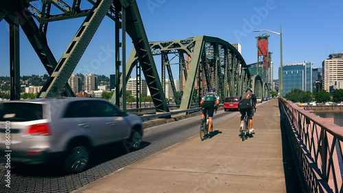 Cyclists and Cars Cross the Hawthorne Bridge Into Portland, Ore