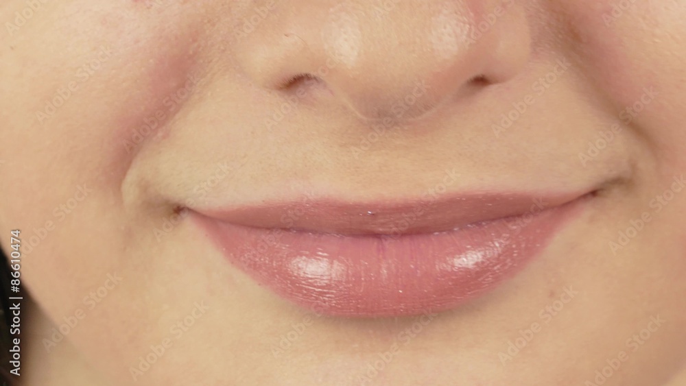 Woman asking for a kiss pursing her lips in a sexy seductive gesture, close up view of her mouth Woman asking for a kiss pursing her lips in a sexy seductive gesture, close up view of her mouth
