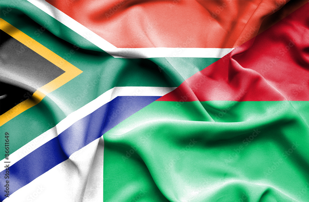 Waving flag of Madagascar and South Africa Waving flag of Madagascar and South Africa