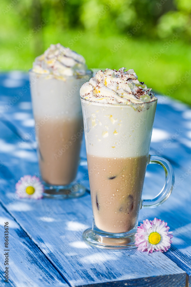 Cold coffee in sunny garden Cold coffee in sunny garden