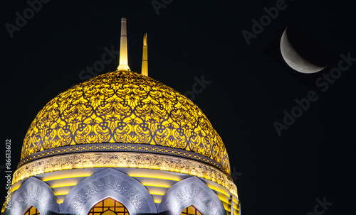 Moon and mosque dome in Oman