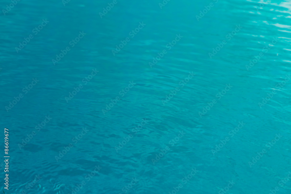 Blue swimming pool rippled water Blue swimming pool rippled water