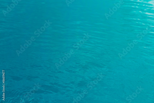 Blue swimming pool rippled water