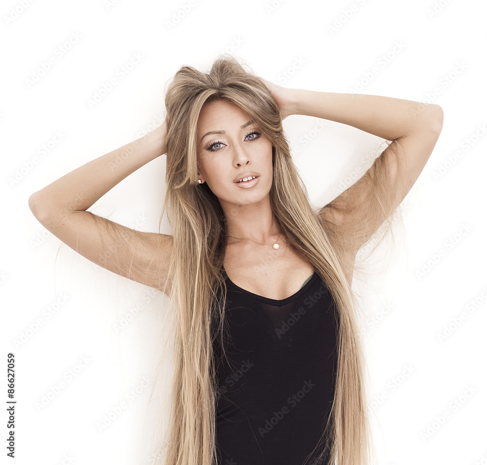Beautiful girl with gorgeous long hair posing Beautiful girl with gorgeous long hair posing