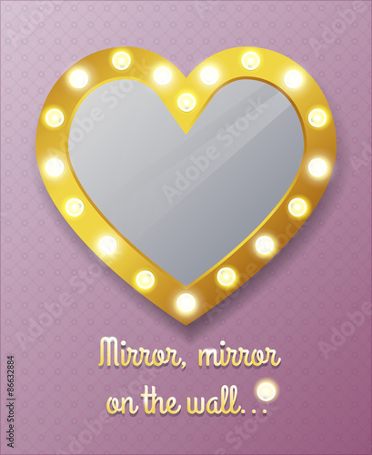 Mirror in shape of heart on wall