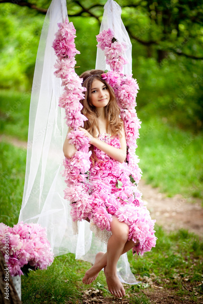 Girl in dress from flowers Girl in dress from flowers