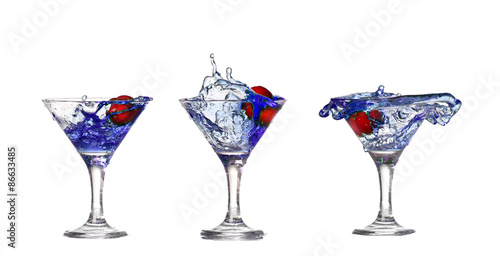 collage blue cocktail with cherry splash on white