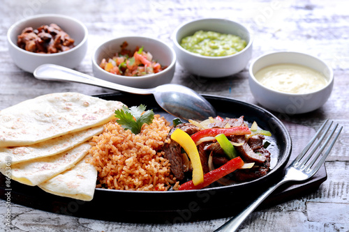 mexican beef fajitas with four different sauces