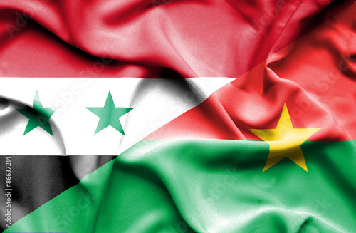 Waving flag of Burkina Faso and Syria