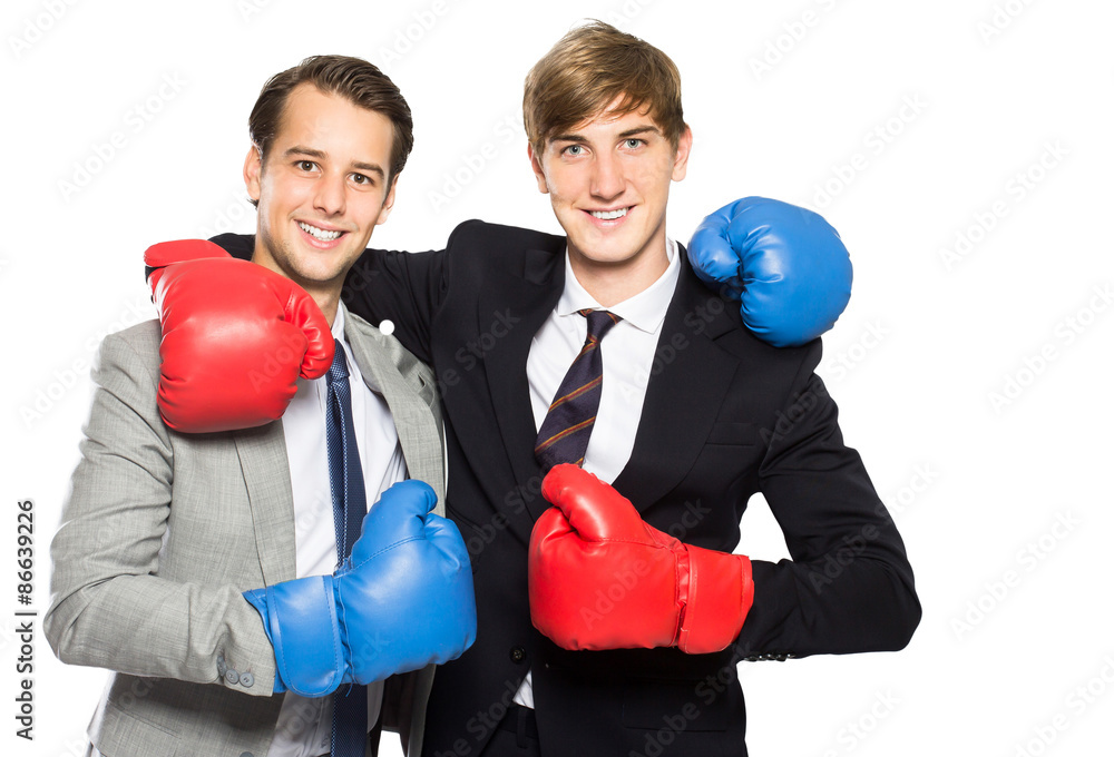 two businessmen wearing boxing gloves two businessmen wearing boxing gloves