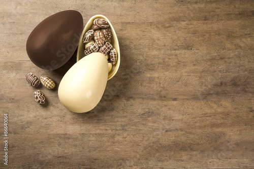 Chocolate Easter Eggs Over Wooden Background