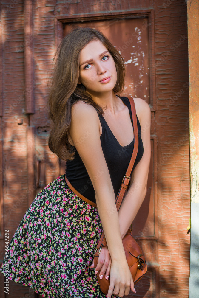 Fototapeta premium Girl with red lips in blue wearing 