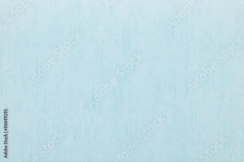 Vertical rough texture of vinyl wallpaper for abstract backgrounds of blue color
