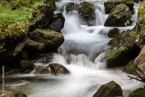 Water flowing between stones