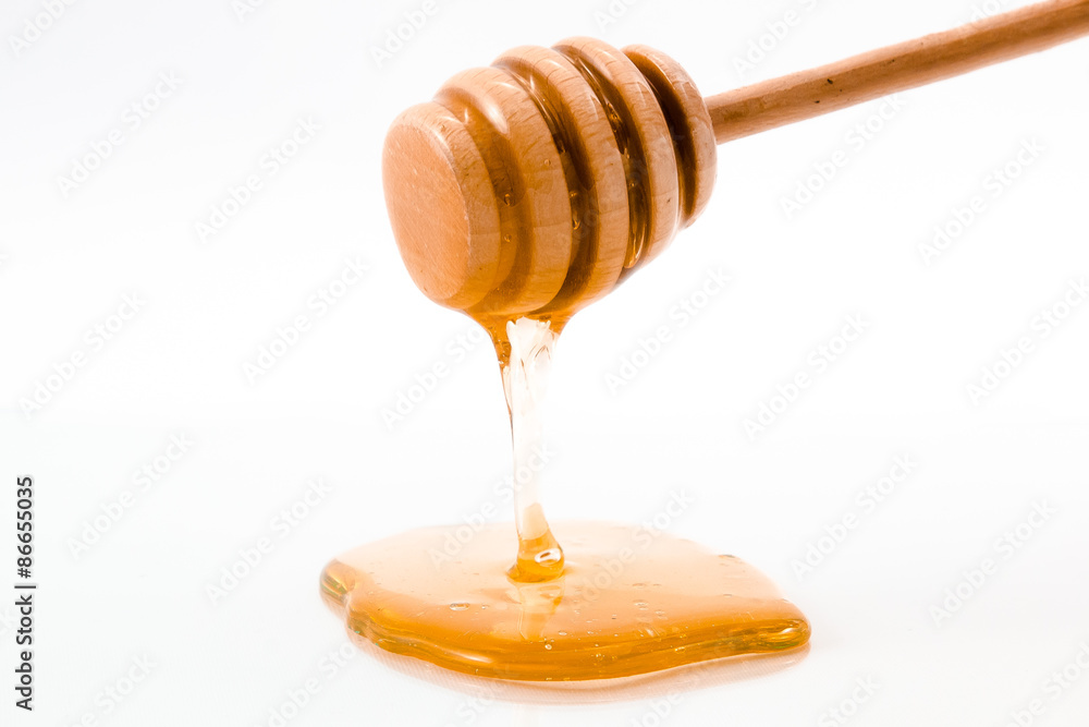 Honey drip isolated on white background Honey drip isolated on white background