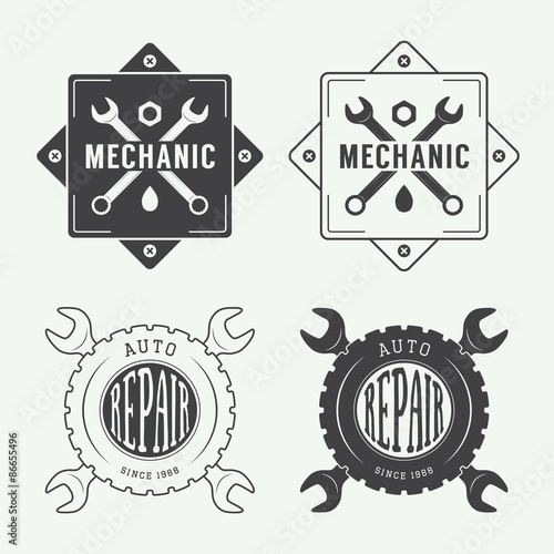 Vintage mechanic label, emblem and logo. Vector illustration
