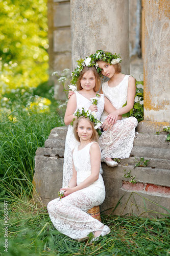 portrait of three girls in a wedding style