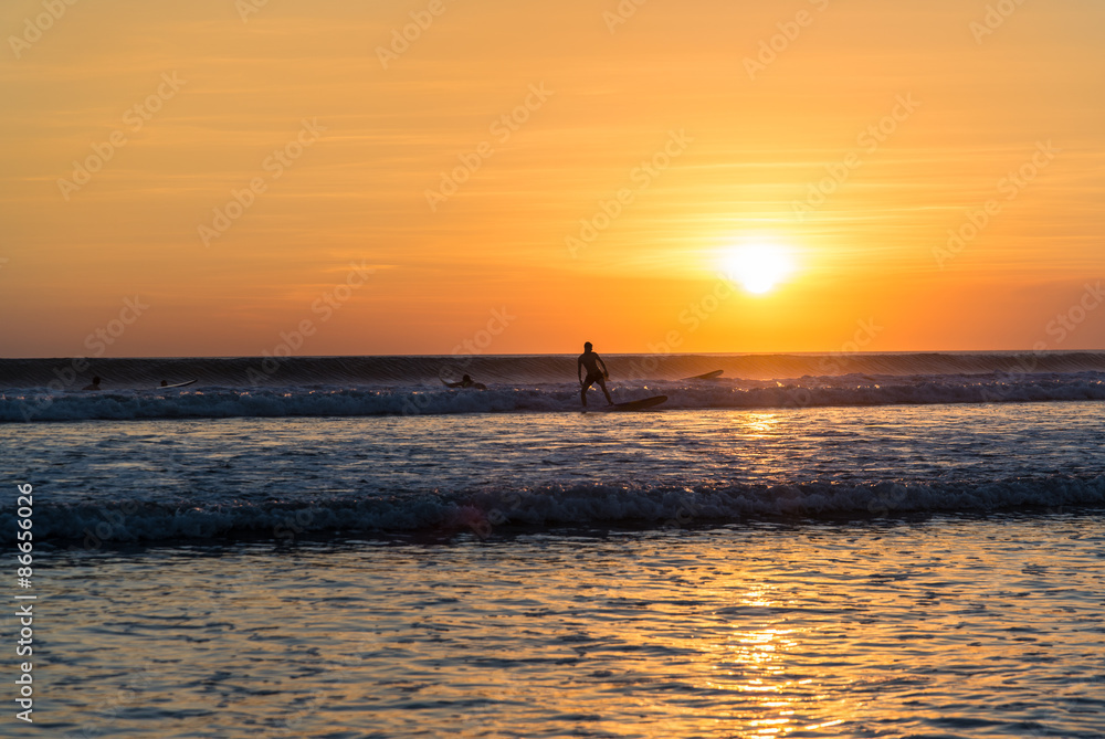 Surfer  at sunset