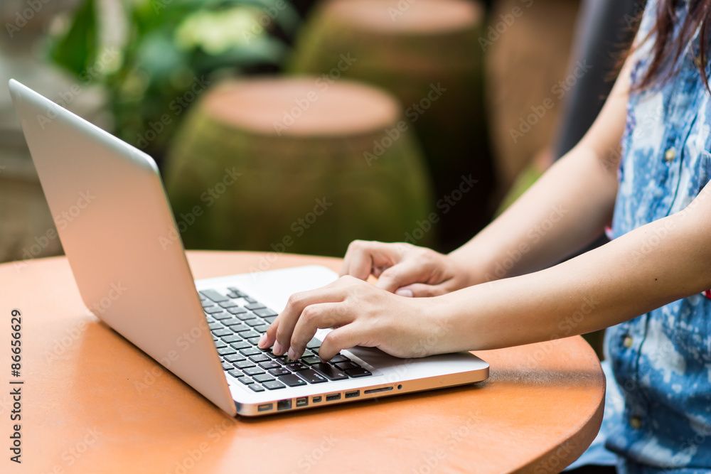 Fototapeta premium Woman hands typing on laptop