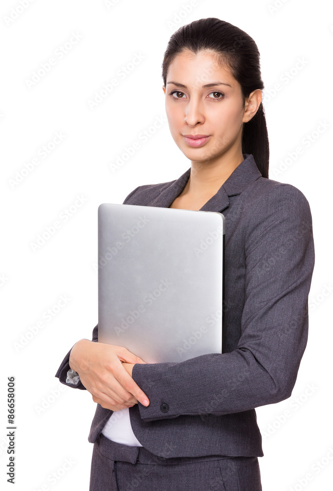 Indian businesswoman holding with notebook computer Indian businesswoman holding with notebook computer