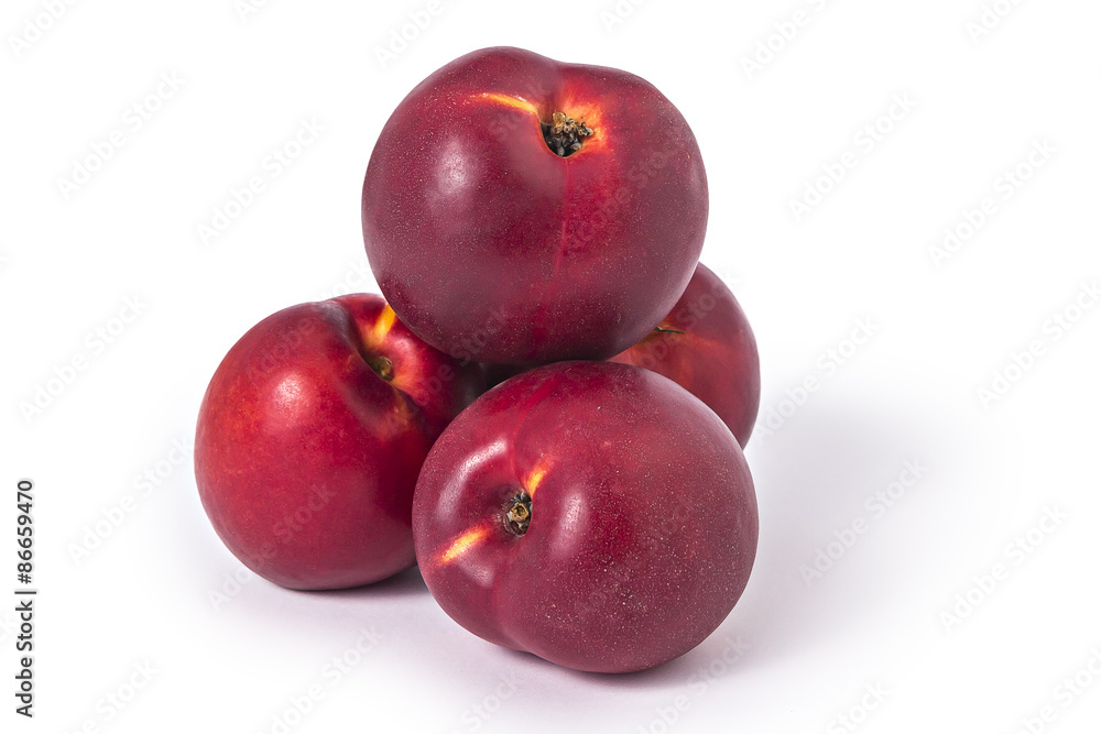 Pile of fresh ripe organic nectarines isolated on white background Pile of fresh ripe organic nectarines isolated on white background