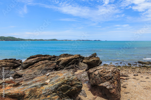 Sky with beautiful beach with rocks and tropical sea