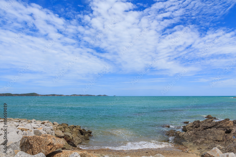 Sky with beautiful beach with rocks and tropical sea Sky with beautiful beach with rocks and tropical sea