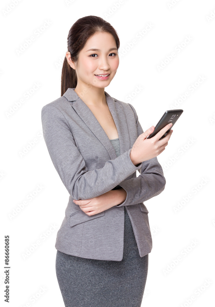 Young Businesswoman use of the cellphone Young Businesswoman use of the cellphone