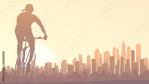 Horizontal illustration of cyclist rides in big city at sunset.