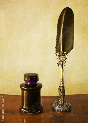 vintage pen with holder, feather and ink pot