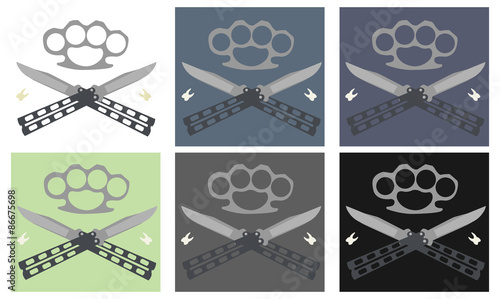 Crossed butterfly knifes with steel brass knuckle emblems