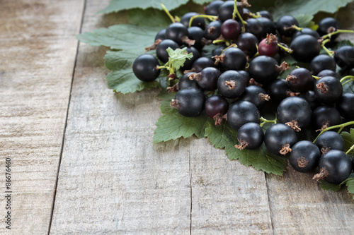 Gooseberries Hybrid on rustic wooden table, copy space