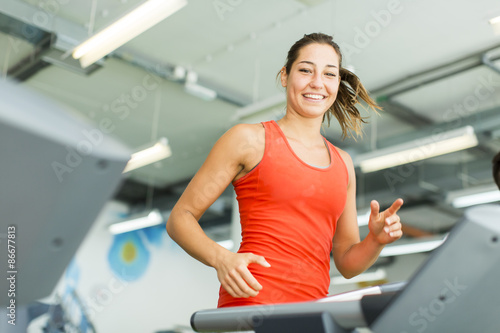 Young woman training in the...