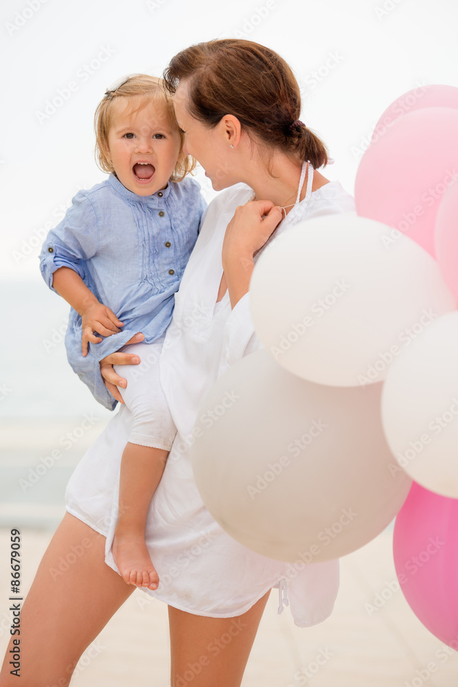 Happy young mother with her small daughter Happy young mother with her small daughter