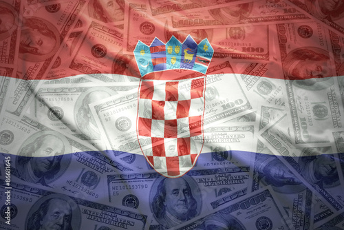 colorful waving croatian flag on a euro money background