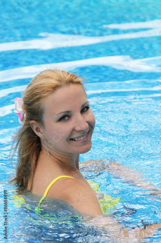 Smiling woman in swimming pool © Angel_a