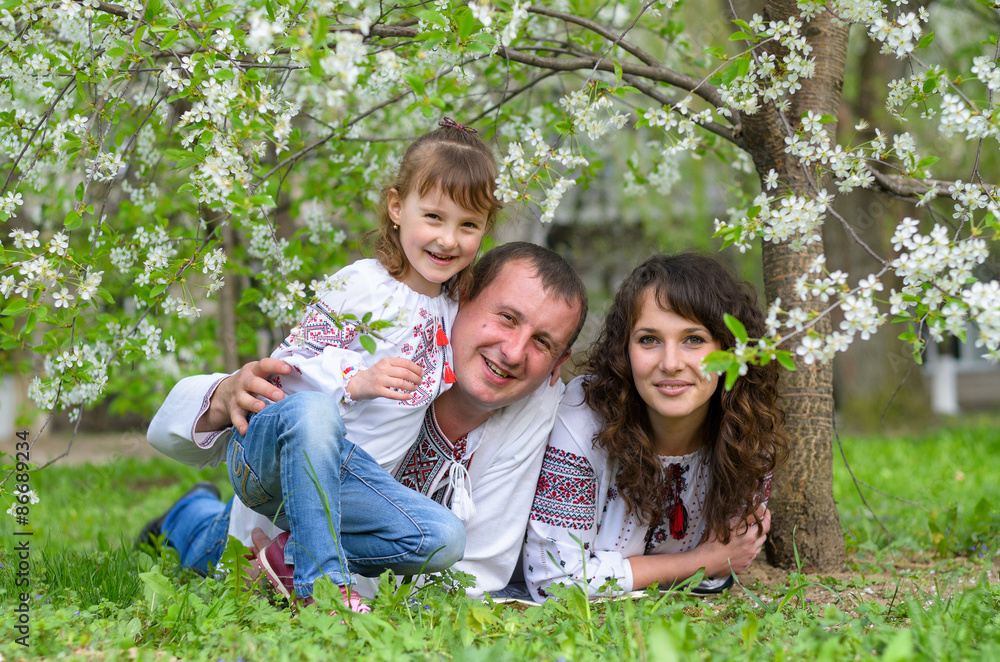Fototapeta premium happy Ukrainian family father mother and daughter