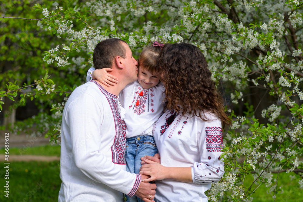 happy Ukrainian family father mother and daughter